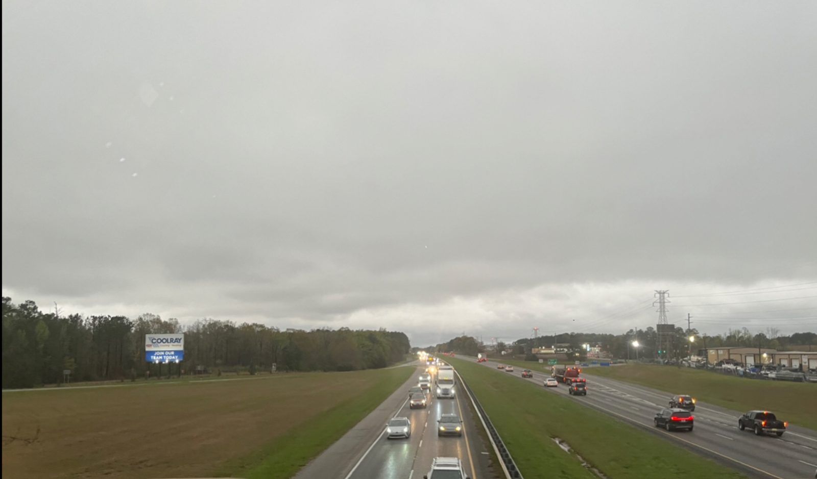 Southbound view along Interstate 65 in central Alabama with commercial highway traffic